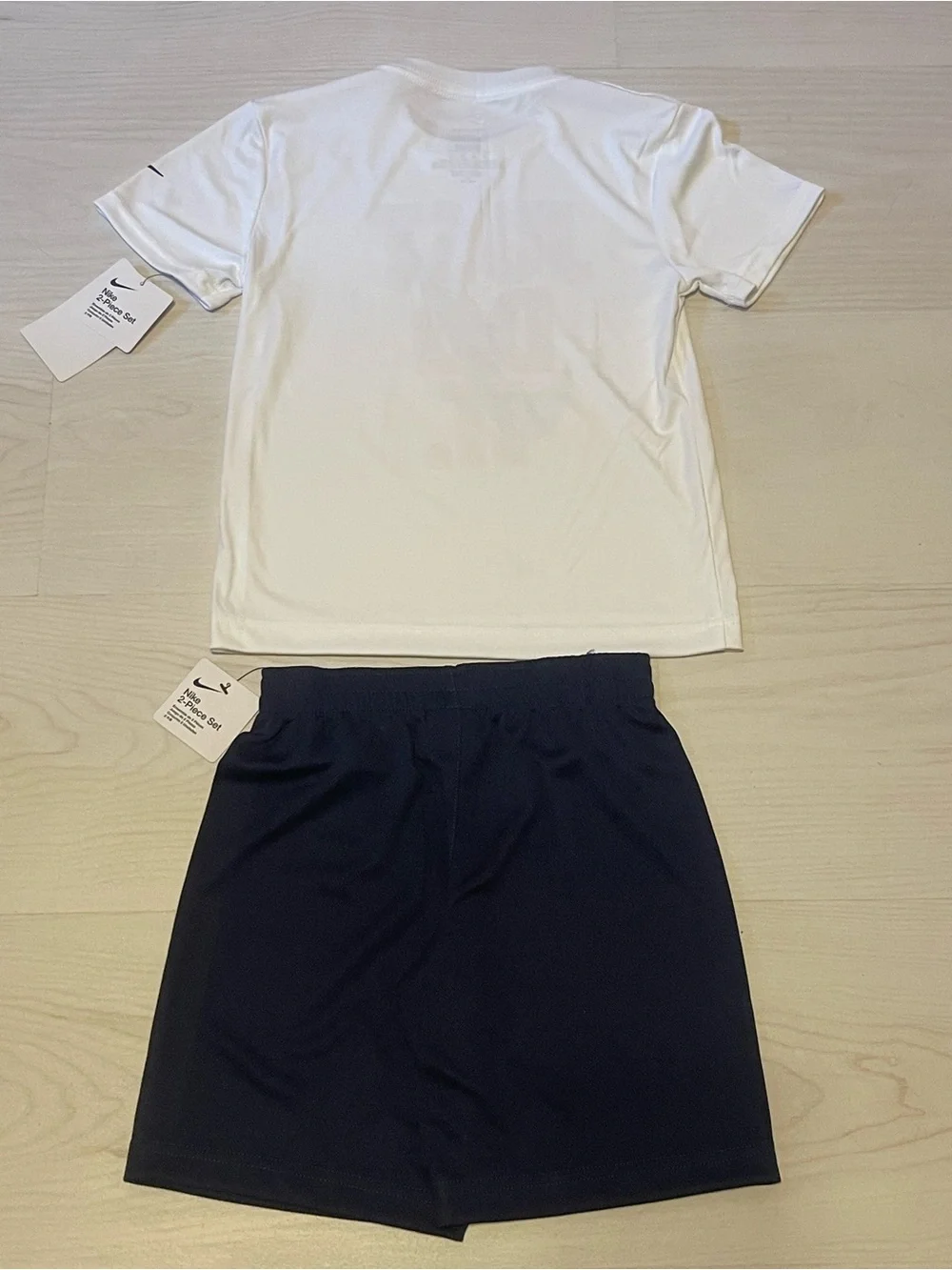 Nike White Tee and Black Shorts Set with Red Graphic